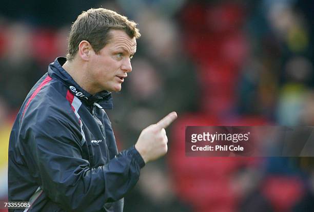 Jim Magilton manager of Ipswich Town watches his team warm-up prior to the FA Cup sponsored by E.ON 5th Round match between Watford and Ipswich Town...