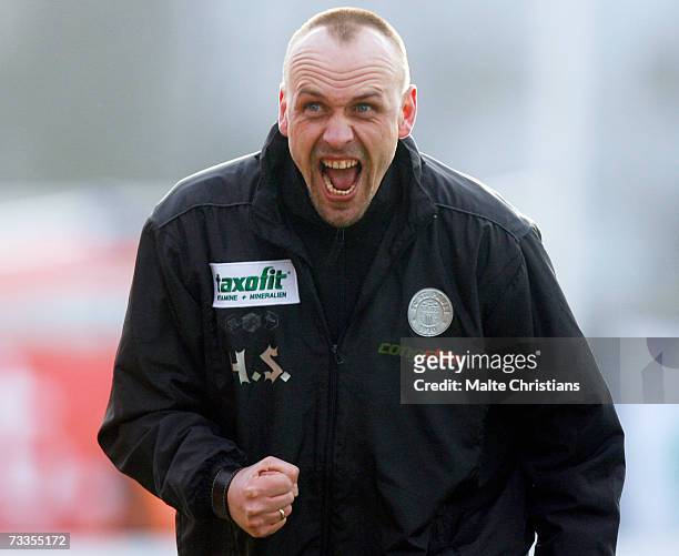 Coach Holger Stanislawski of Pauli celebrates the victory during the Third League match between FC St.Pauli and VFB Luebeck at the Millerntor stadium...