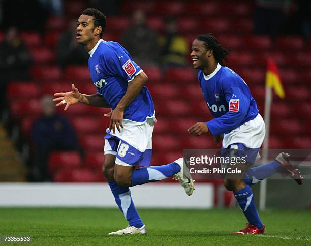 Jubilant Jaime Peters and Danny Haynes of Ipswich Town turn to realise the game has continued unaware the goal has been ruled out during the FA Cup...