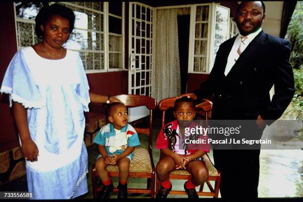 The Prime Minister of Rwanda Agathe Uwilingiyimana with her husband, Ignace, and two of their children, Aimé-Michel and Charles-Théophile.
