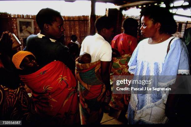 Rwandan Prime Minister Agathe Uwilingiyimana visits Nyacyonga refugee camp.