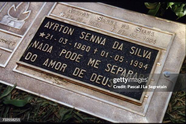 Funeral of Brazilian triple Formula One World Champion Ayrton Senna at the Morumbi cemetery. Senna's grave, with the inscription "Nothing can...