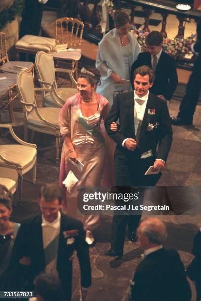 Princess Alexia of Greece leaves the church of Graasten on the arm of her father, Prince Nicolas.