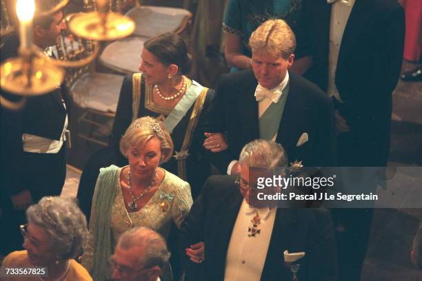 Princess Irene of Greece leaves the church of Graasten Castle on the arm of Willem-Alexander.