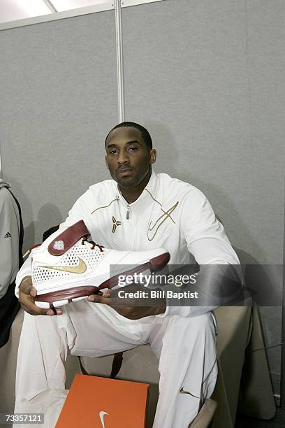 Kobe Bryant of the West All-Star Team shows off his new shoes during the 2007 West All-Stars Practice at NBA Jam Session Center Court on February 17,...