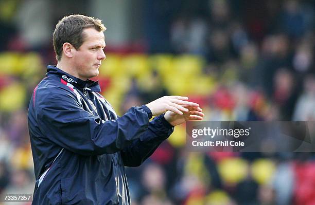 Jim Magilton manager of Ipswich Town watches his team warm-up prior to the FA Cup sponsored by E.ON 5th Round match between Watford and Ipswich Town...