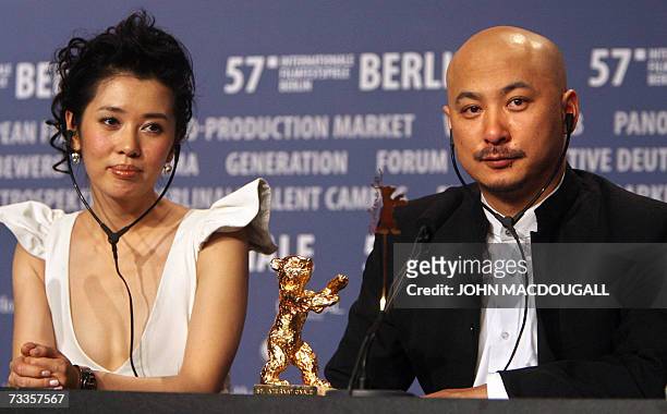 Chinese actress Nan Yu and director Wang Quan'an address the closing press conference of the 57th Berlinale International Film Festival in Berlin 17...