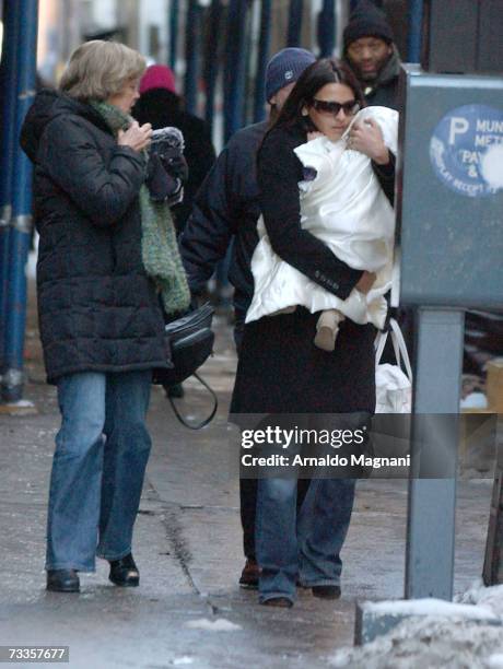 Matt Damon's wife Luciana Damon and daughter Isabella are seen on a movie set for his new film "The Bourne Ultimatum" February 17, 2007 in New York...