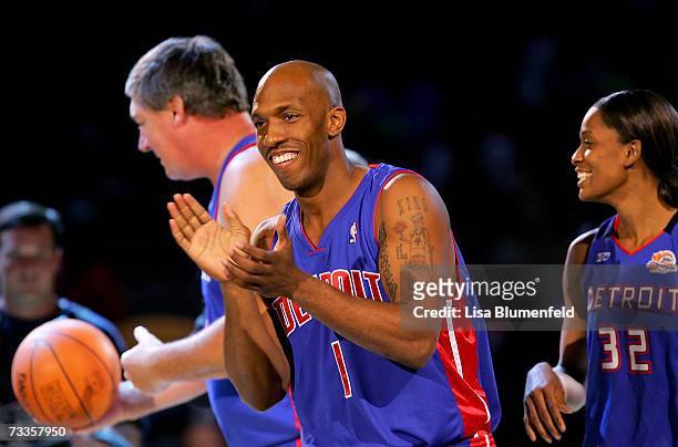 Chauncey Billups of the Detroit team claps after completing the Haier Shooting Stars Competition during NBA All-Star Weekend on February 17, 2007 at...