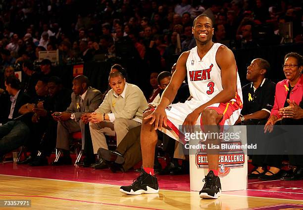 Dwyane Wade of the Miami Heat laughs on the court during the PlayStation Skills Challenge during NBA All-Star Weekend on February 17, 2007 at Thomas...