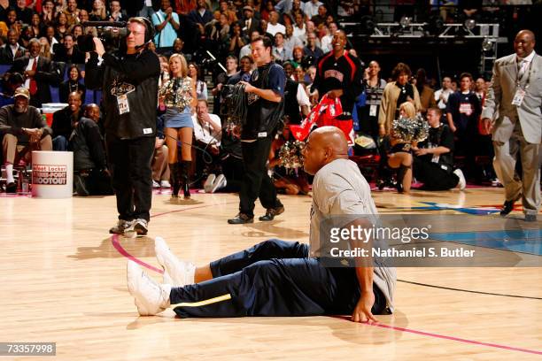 Legend Charles Barkley is seen on the court after he beat NBA referee Dick Bavetta in a Foot Race during All-Star Saturday Night during the NBA...