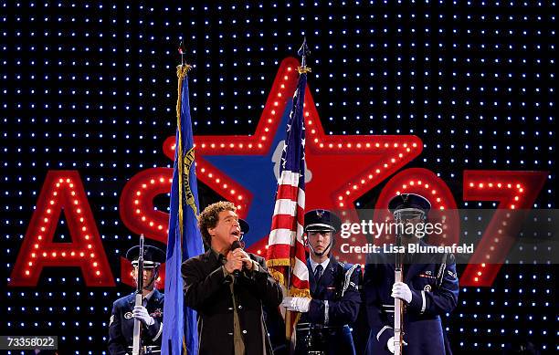 Clint Holmes sings the national anthem before the start of the Haier Shooting Stars Competition during NBA All-Star Weekend on February 17, 2007 at...