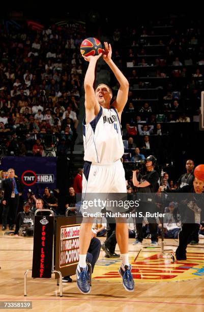 Dirk Nowitzki of the Dallas Mavericks shoots the money ball during the Footlocker Three-Point Shootout at NBA All-Star Weekend on February 17, 2007...