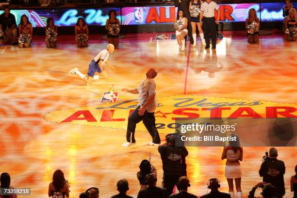 Former NBA player Charles Barkley races against NBA referee Dick Bavetta during All-Star Saturday night as part NBA All-Star Weekend on February 17,...