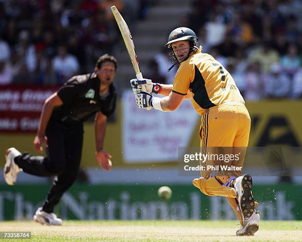 Cameron White of Australia plays off a delivery from Darryl Tuffey of New Zealand during the second one-day international match of the...