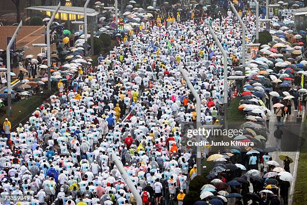 Runners run through the Shinjuku district during the Tokyo Marathon 2007 on February 18, 2007 in Tokyo, Japan. Some 30,000 people participated in the...