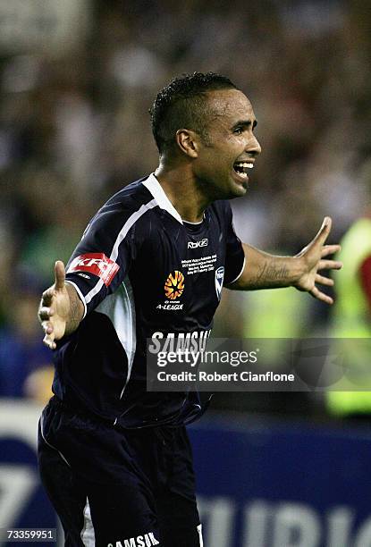 Archie Thompson of the Victory celebrates his fifth goal during the Hyundai A-League Grand Final between the Melbourne Victory and Adelaide United at...