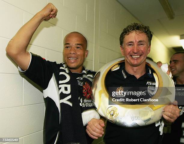 Alessandro celebrates with Victory coach Ernie Merrick after Victory defeated United six nil in the Hyundai A-League Grand Final between the...