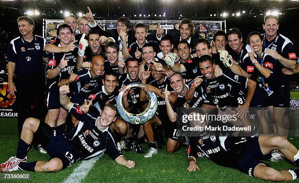 Melbourne Victory players celebrate with the trophy after winning the Hyundai A-League Grand Final between the Melbourne Victory and Adelaide United...
