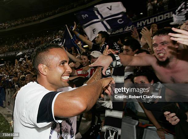 Archie Thompson of the Victory celebrates with fans after Victory defeated United six nil at the Hyundai A-League Grand Final between the Melbourne...