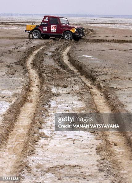 Indian Rally Driver Indian rally driver Achal Kumar takes part in a stage of the 'Fifth ...