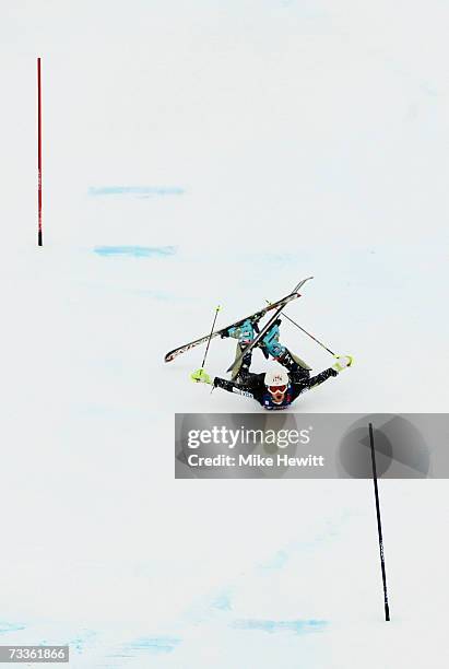 Resi Stiegler of the United States of America copies the "penguin dive" of Anja Paerson of Sweden after she falls while competing during the Nations...