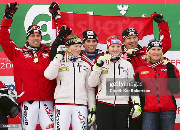 The team from Austria comprising of Mario Matt, Marlies Schild, Benjamin Raich, Michaela Kirchgasser, Fritz Strobl and Renate Goetschl celebrate with...