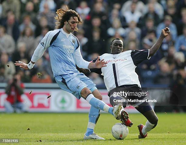 Georgios Samaras of Manchester City battles for the ball with Seyfo Soley of Preston North End during the FA Cup sponsored by E.ON Fifth Round match...