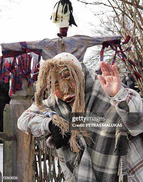 Man poses 18 February 2007 during the 'Uzgavenes' celebrations, the farewell to winter, which comes on the seventh week before Easter, in Vilnius,...