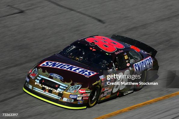 Snickers Dark Car Ricky Rudd Ricky Rudd, driver of the Snickers Ford, drives during the NASCAR ...