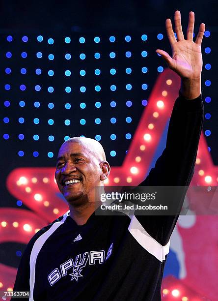 Legend George Gervin waves to the crowd before the start of the Haier Shooting Stars Competition during NBA All-Star Weekend on February 17, 2007 at...