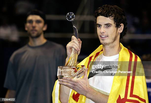 Andy Murray of Great Britain celebrates with the SAP Open trophy after defeating Ivo Karlovic of Croatia in the SAP Open finals held at the HP...