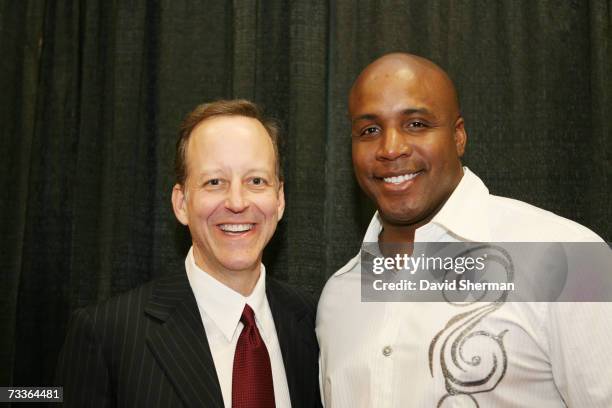 Reporter Jim Gray poses with San Francisco Giants outfielder Barry Bonds prior to the 2007 NBA All-Star Game on February 18, 2007 at the Thomas &...