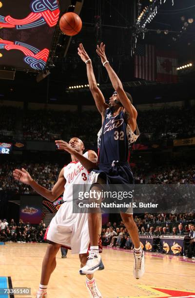 Richard Hamilton of the Eastern Conference attempts a shot against Ray Allen of the Western Conference during the 2007 NBA All-Star Game on February...