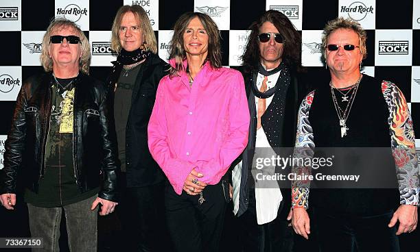 Aerosmith band members Brad Whitford, Tom Hamilton, Steven Tyler, Joe Perry and Joey Kramer attend a photocall to promote 'Hyde Park Calling' at The...