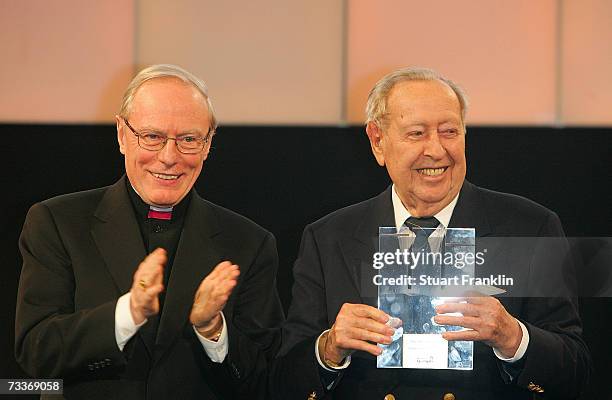 Doctor Werner Thissen, Bishop of Hamburg presents Hans Peter Schumann, with his lifetime achievement award during the 2007 Hamburger Sportgala at the...