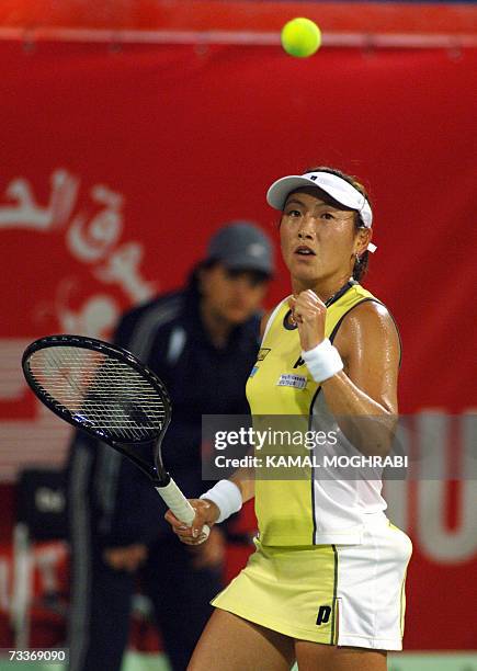 Dubai, UNITED ARAB EMIRATES: Japanese player Ai Sugiyama reacts after winning the first set against her Tunisian opponent Selima Sfar during their...