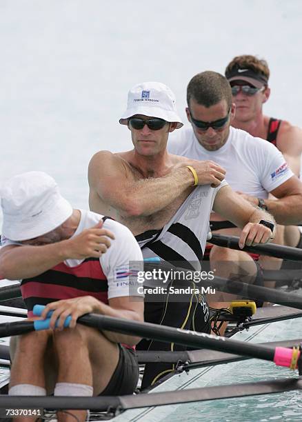 Mahe Drysdale of Auckland pulls his singlet up at the start line before heat one of the Mens Premier coxless quad during the New Zealand Rowing...