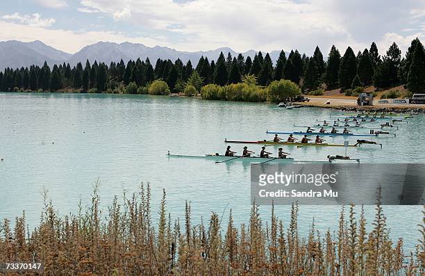 General view shows rowers lining up for the start of a heat of the womens four during the New Zealand Rowing Nationals at Lake Ruataniwha, February...