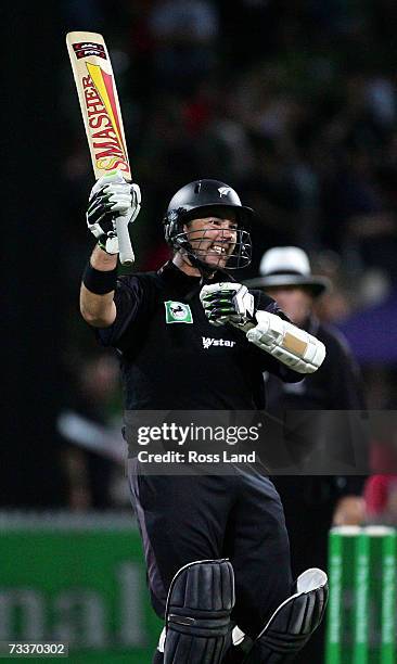 Craig McMillan of New Zealand celebrates his century during the third One-Day International match of the Chappell-Hadlee Trophy series between New...