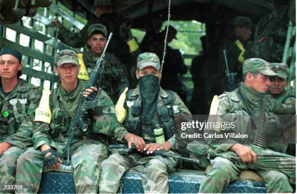 Colombian army troops arrive in the town of Puerto Asis, November 12, 2000 in the Putamayo province of Colombia. Nearly 1000 troops arrived in...