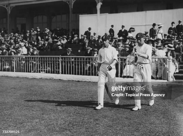 English cricketers Jack Hobbs and Phil Mead go out to bat for Pelham Warner's team against Gilbert Jessop's team in a Test Trial at Bramall Lane,...