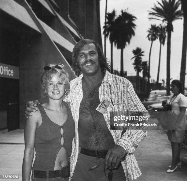 American actor Don Stroud with Sally Little at the California 500 Ontario Motor Speedway race, circa 1972.