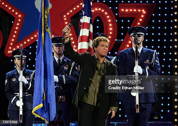 Entertainer Clint Holmes sings the national anthem before the start of the Haier Shooting Stars competition during NBA All-Star Weekend at the Thomas...