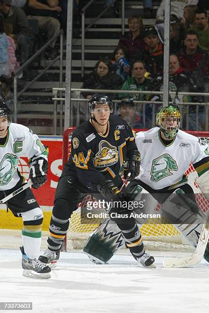 Chris Stewart of the Kingston Frontenacs stations himself in front of Steve Mason of the London Knights in game at the John Labatt Centre on February...