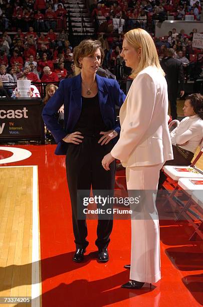Head coach Brenda Frese of the Maryland Terrapins and head coach Gail Goestenkors of the Duke Blue Devils talk before the game February 18, 2007 at...