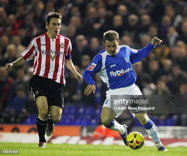 Gary McSheffrey of Birmingham is challenged by Dean Whitehead of Sunderland during the Coca-cola Championship match between Birmingham City and...