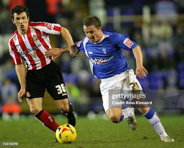 Gary McSheffrey of Birmingham is challenged by Liam Miller of Sunderland during the Coca-cola Championship match between Birmingham City and...