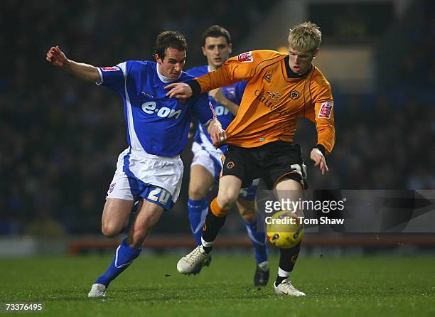 David Wright of Ipswich tussles with Andy Keogh of Wolves during the Coca-Cola Championship match between Ipswich Town and Wolverhampton Wanderers at...