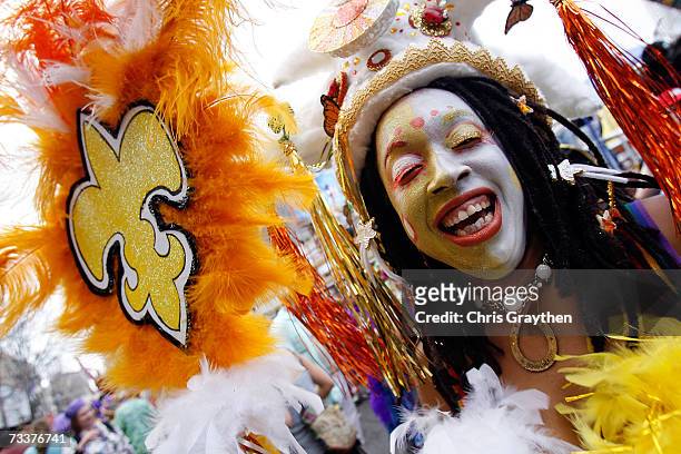Reveler in the Mondo Kayo parade dances through the streets on Mardi Gras Day February 20, 2007 in New Orleans, Louisiana. Mardi Gras is being...